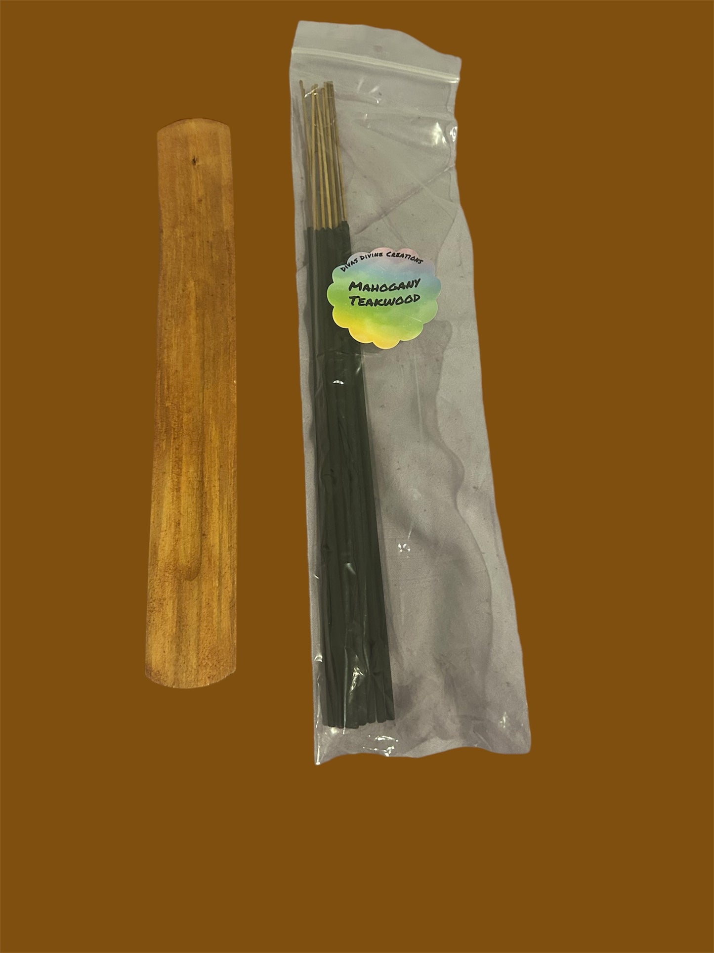 Mahogany teakwood scented hand dipped incense. Comes with incense holder. Comes with a pack of 10 incense sticks.